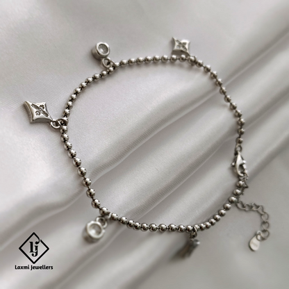 Elegant Silver Beaded Charm Bracelet with Delicate Dangles – Laxmi Jewellers