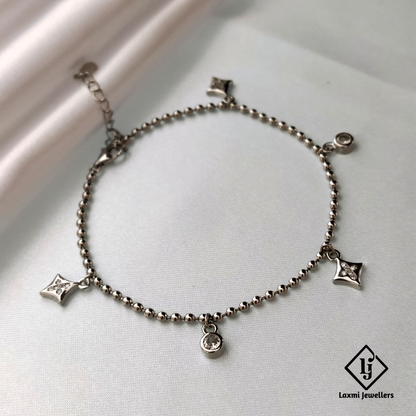 Elegant Silver Beaded Charm Bracelet with Delicate Dangles – Laxmi Jewellers