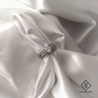 Elegant Round Solitaire Diamond Ring with Baguette Accents – Laxmi Jewellers