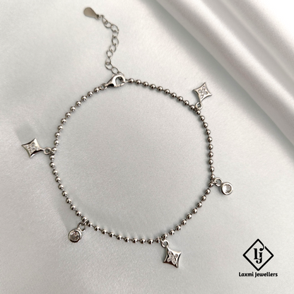 Elegant Silver Beaded Charm Bracelet with Delicate Dangles – Laxmi Jewellers