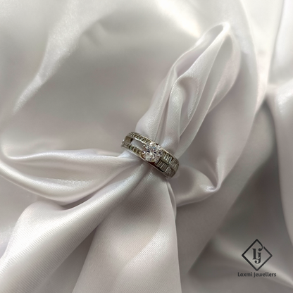 Elegant Round Solitaire Diamond Ring with Baguette Accents – Laxmi Jewellers