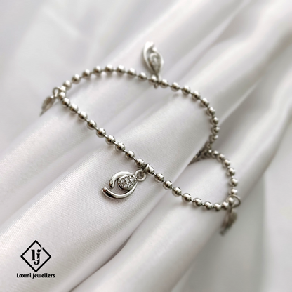 Elegant Silver Beaded Bracelet with Leaf Charms – Laxmi Jewellers