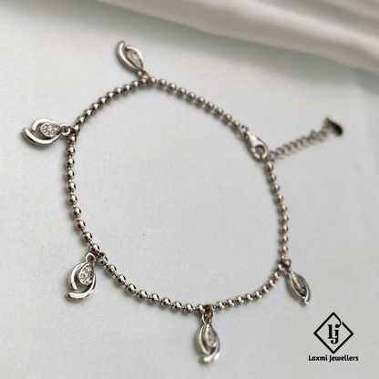Elegant Silver Beaded Bracelet with Leaf Charms – Laxmi Jewellers